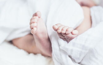 Trois parents et un couffin